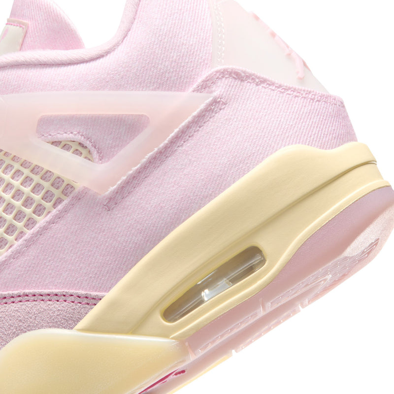 Close-up of light pink retro 4 midsole with clear air unit and cream sidewall