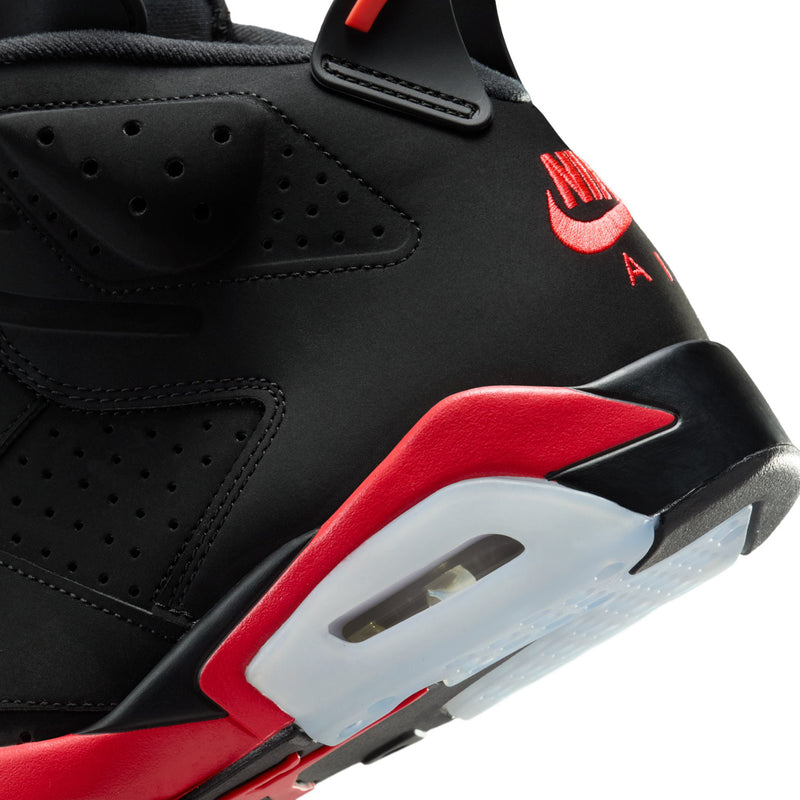 Black sneaker with red/white air window and perforated side panels