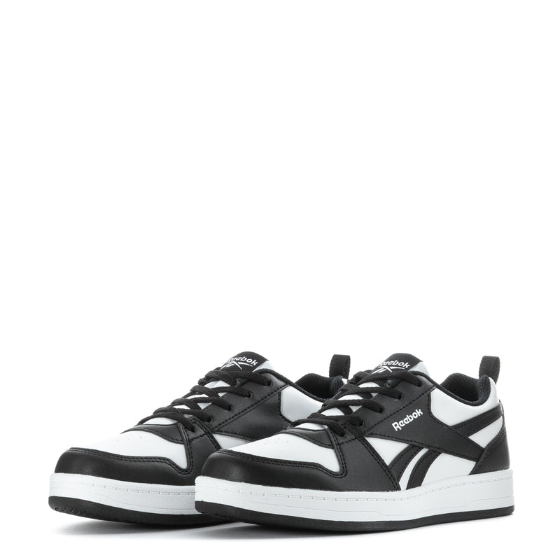Kids Reebok sneakers, black and white, two pairs shown with lace-up fronts.