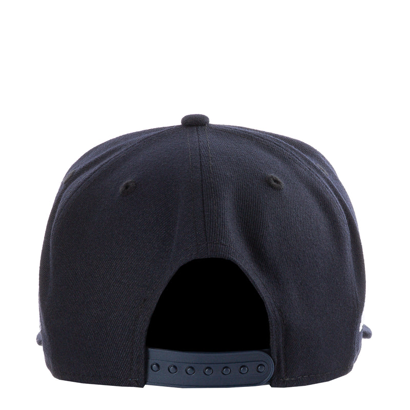 Navy baseball cap back view with adjustable strap