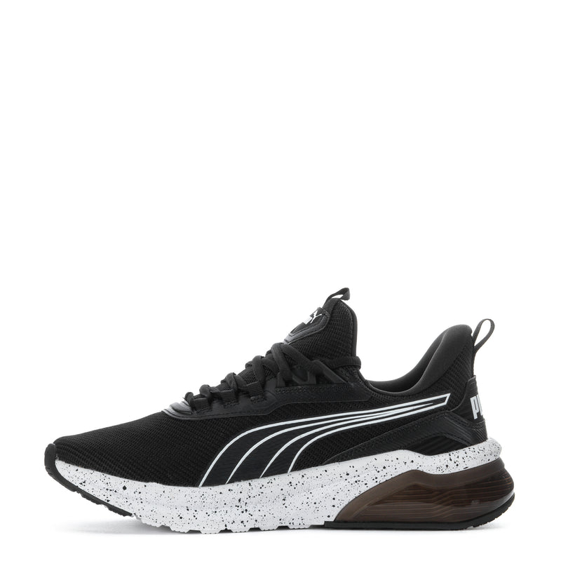 Men's black athletic sneaker with white PUMA stripes and speckled sole