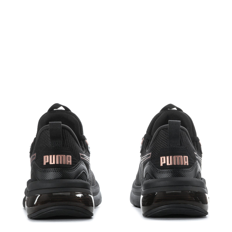 Black women's sneakers heel back view with Puma text and cushioned sole
