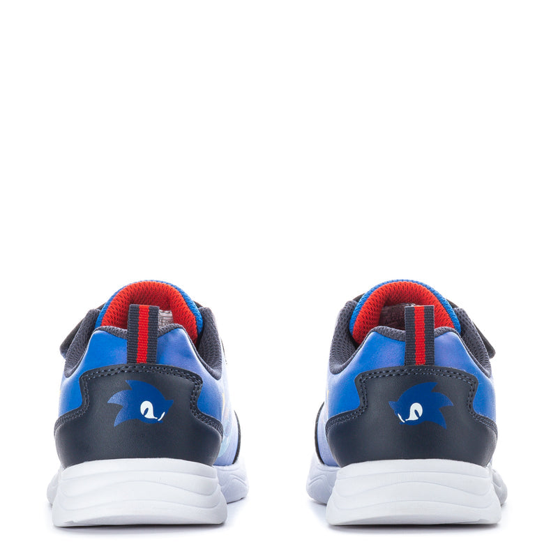 Kids blue and navy low-top sneakers with back Sonic emblem, red pull tab, and white sole