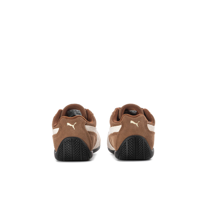 Kids brown lace-up sneakers from the heel, black textured sole and Puma logo