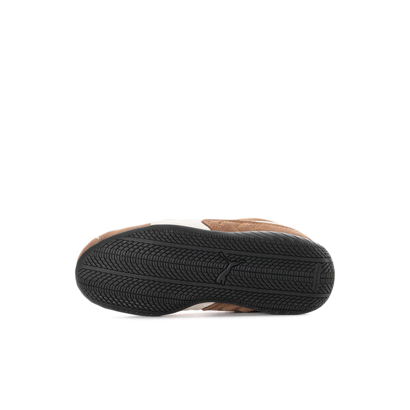 Kids sneaker outsole view with textured black tread on the bottom