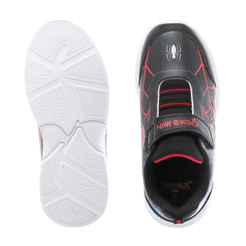 Kids sneaker outsole view: white tread sole and black interior heel with red accents