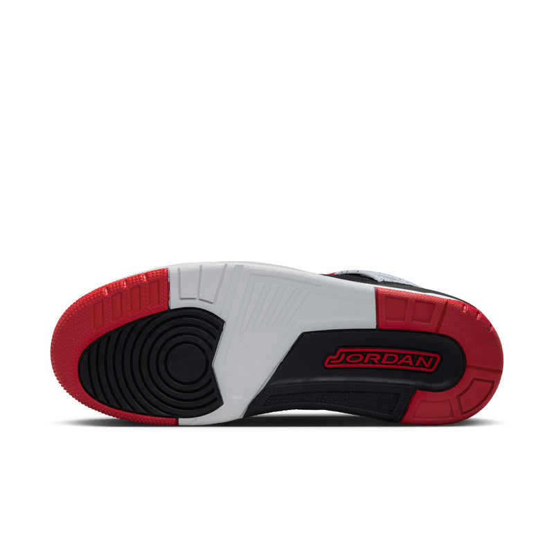 Shoe outsole with white and black tread and red section, marked JORDAN