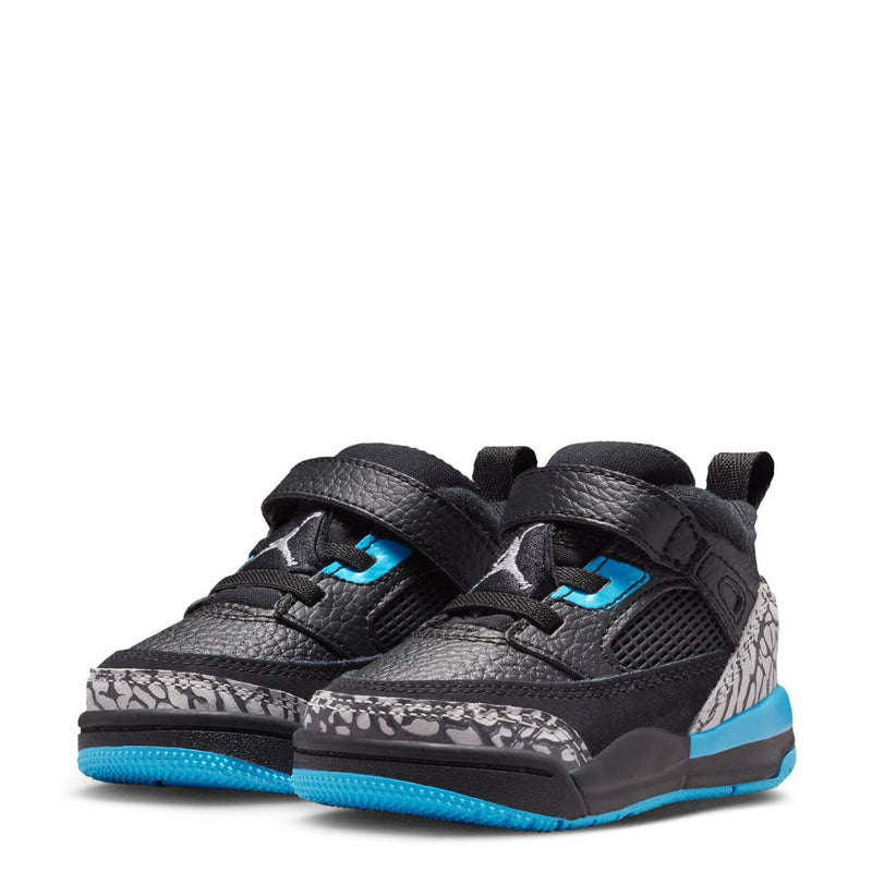Black toddler low-top sneakers pair with blue outsole and speckled side panels