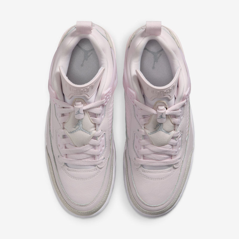 Pair of women’s pearl pink low-top sneakers, viewed from above with lace-up tops