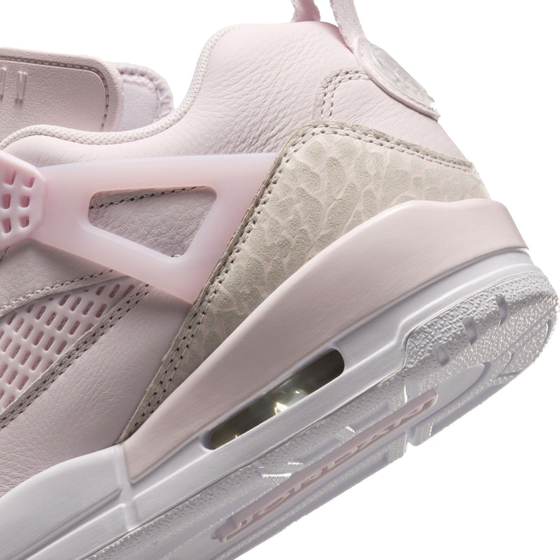 Close-up of women’s low-top sneakers showing mesh panel and air window on midsole