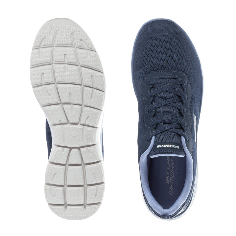 Navy lace-up sneaker showing white rubber outsole and padded interior