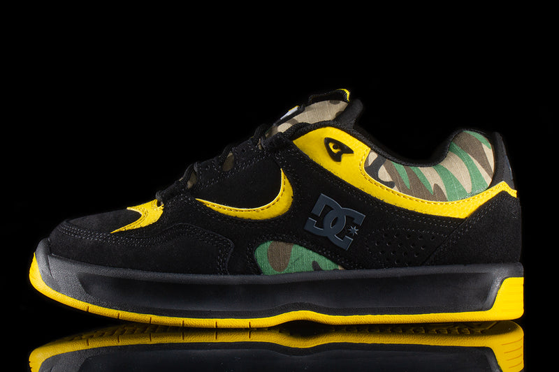 Thrasher x DC Kalynx Style # ADYS100805-BCM Color : Black / Camo / Yellow