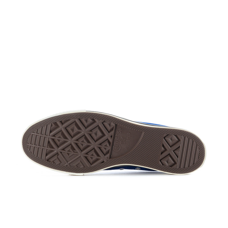 Brown rubber outsole with textured tread pattern for traction