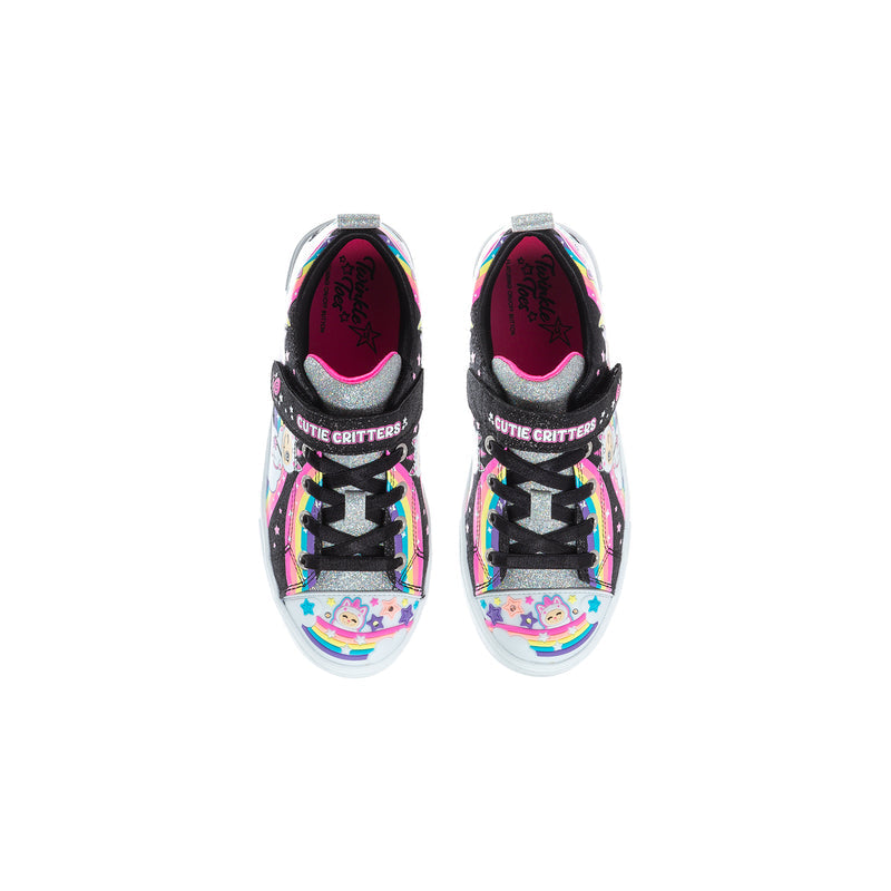 Kids sneakers front view with multicolor character graphics, black glitter details, white sole