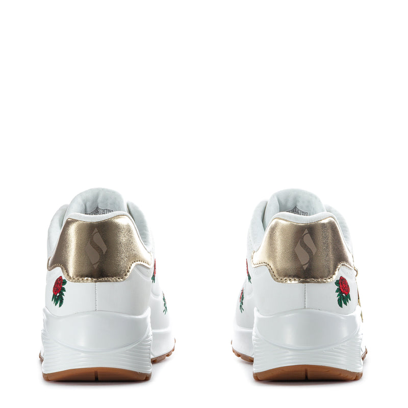 White women's sneakers with gold heel trim, red rose embroidery, cushioned heel window