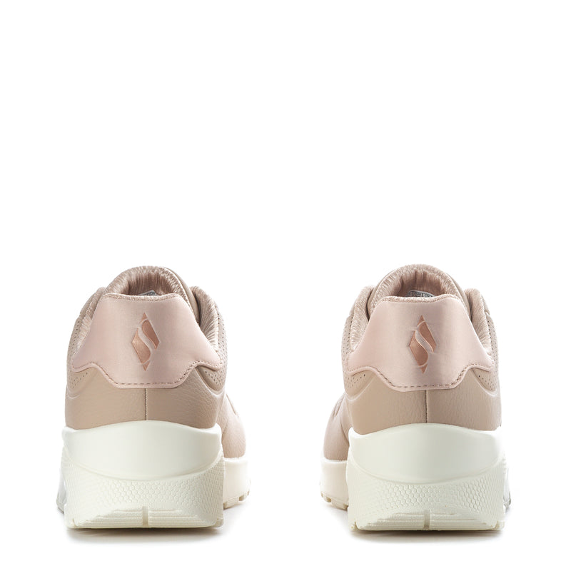 Women’s taupe and white sneakers rear view with cushioned heel collar