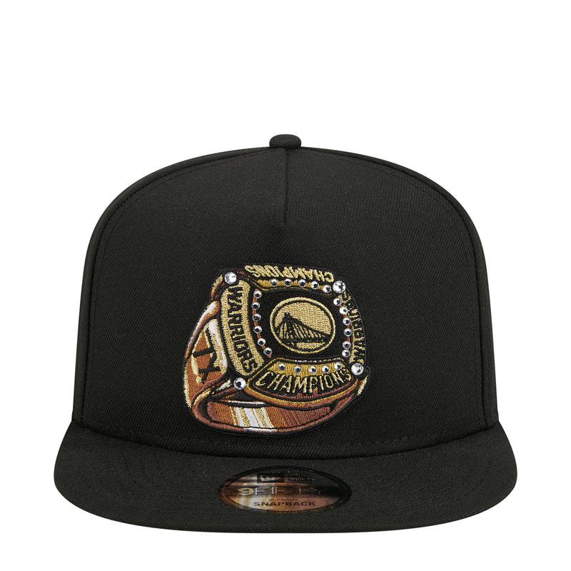 Black snapback cap with Warriors Champions ring graphic patch on the front
